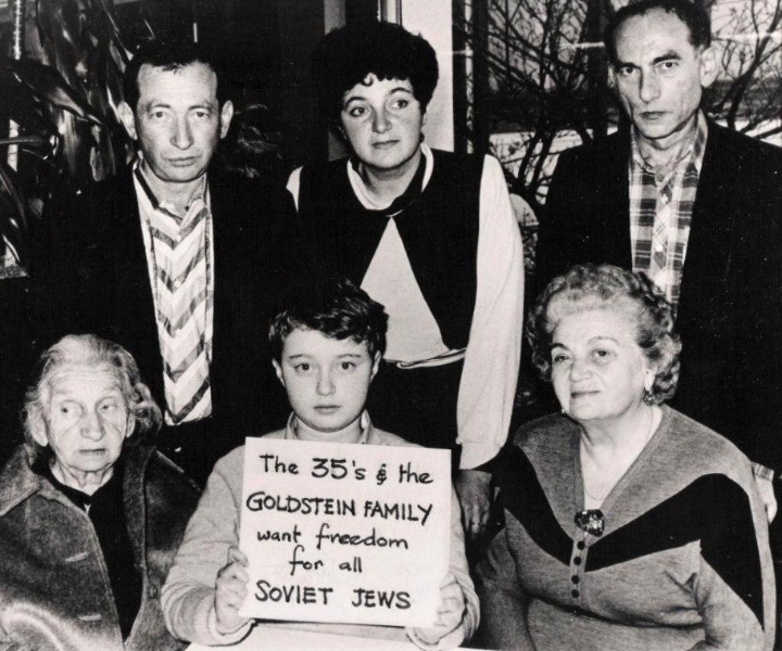 Goldstein family with 35s banner